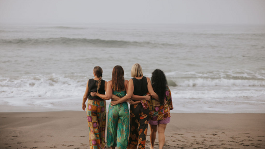 Women Walking On The Beach
